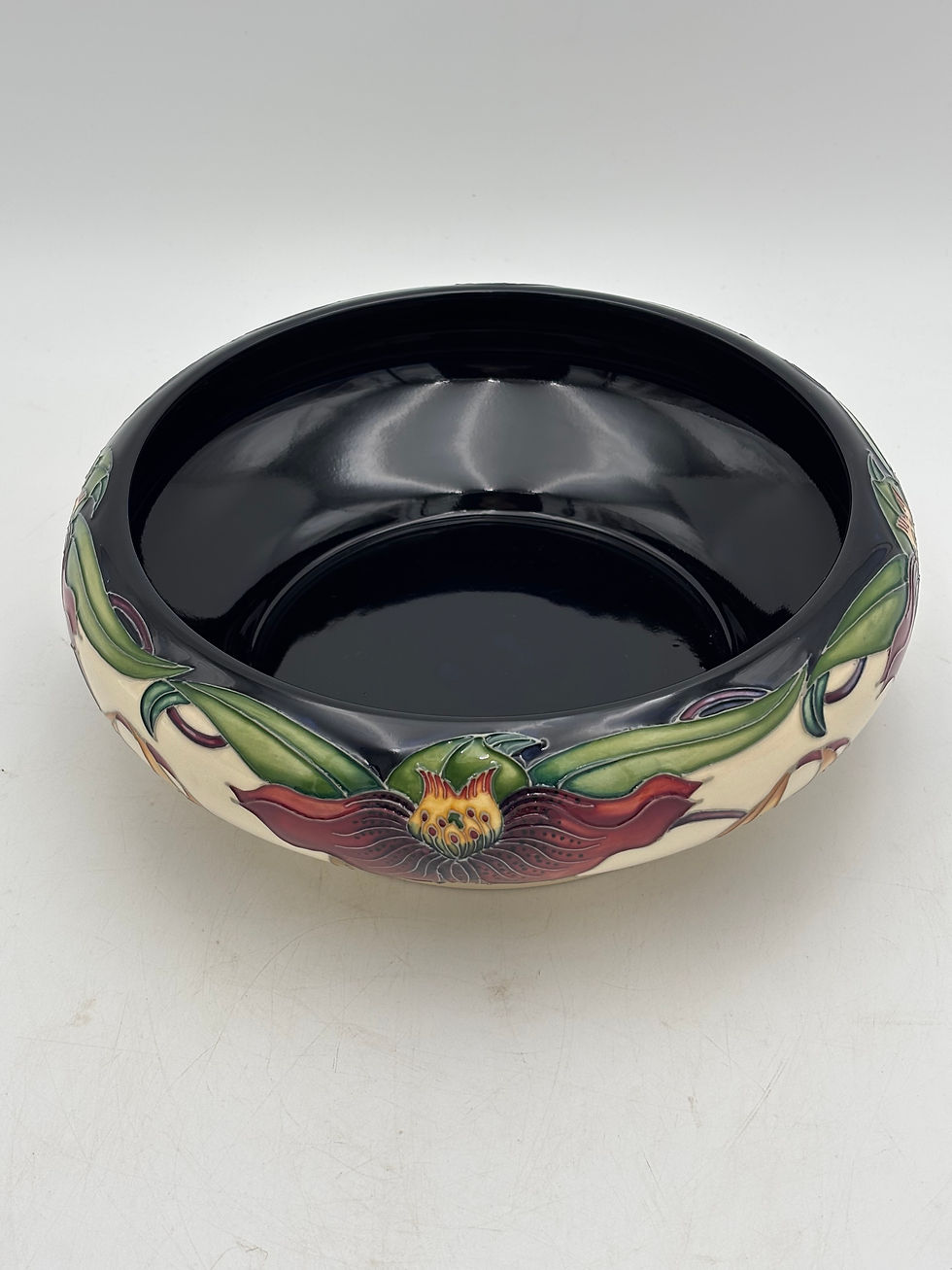 Thumbnail: Moorcroft pottery footed bowl featuring the 'Anna Lily' pattern, which was desig