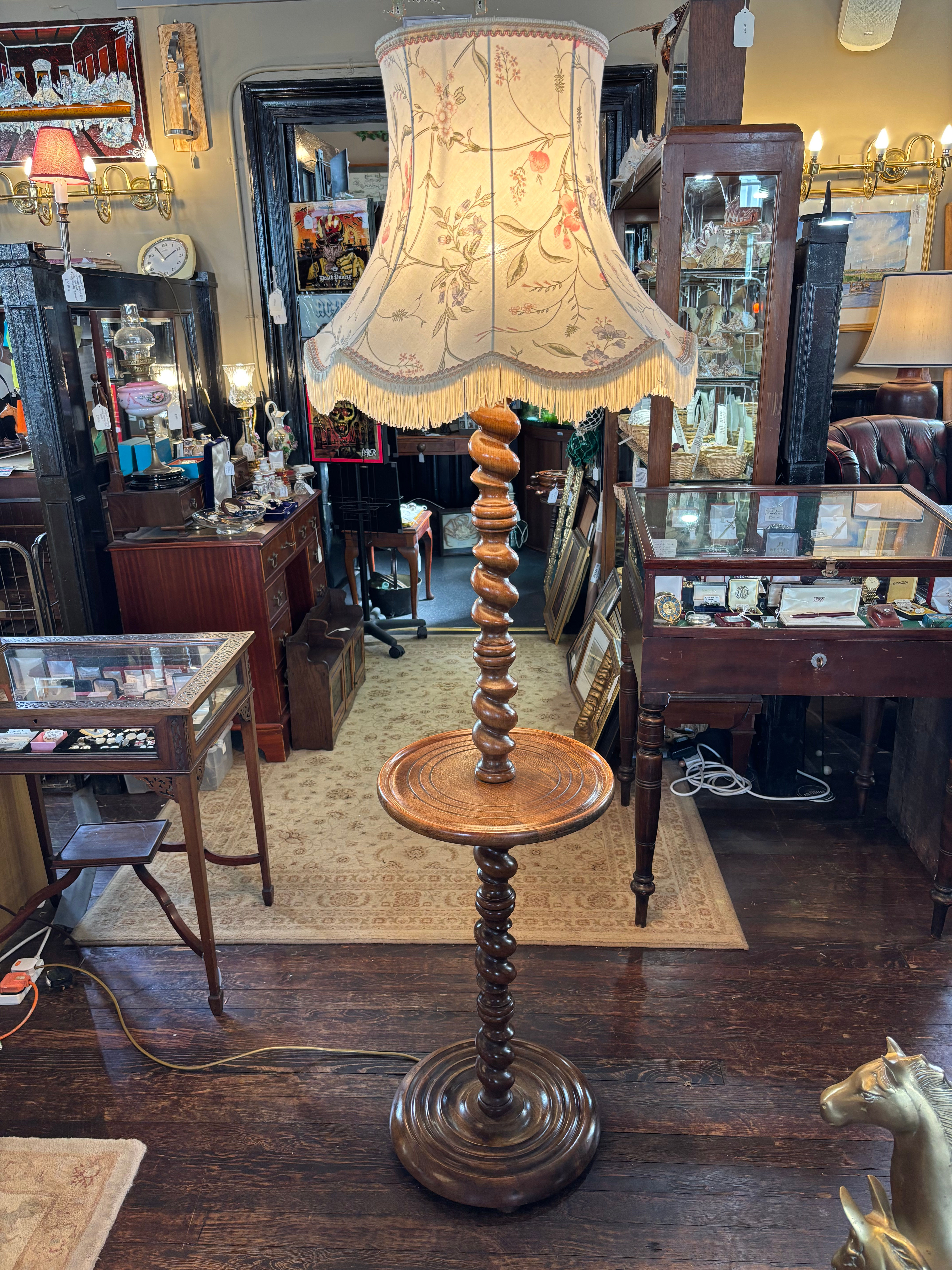 Vintage oak barley twist floor lamp table featuring an integrated circular smoki