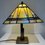Thumbnail: Tiffany Style Table Lamp With Geometric Amber & Cream Pearlessant Shade 