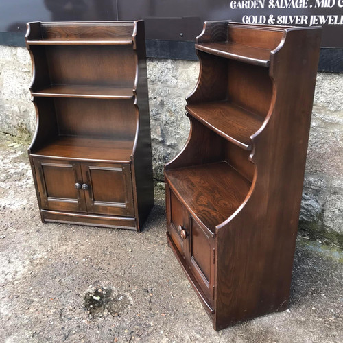 Pair Ercol waterfall bookshelves with cupboard. Strichen Antiques