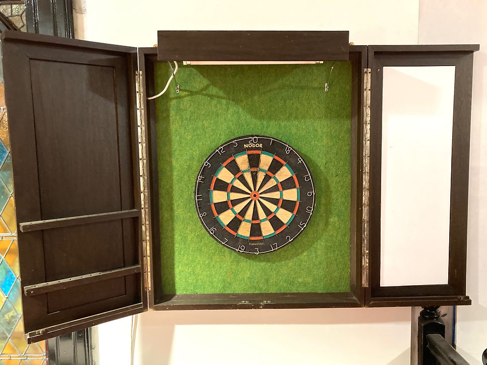 Thumbnail: ON SALE Dartboard Cabinet Decoratively Carved In An Indonesian Style.