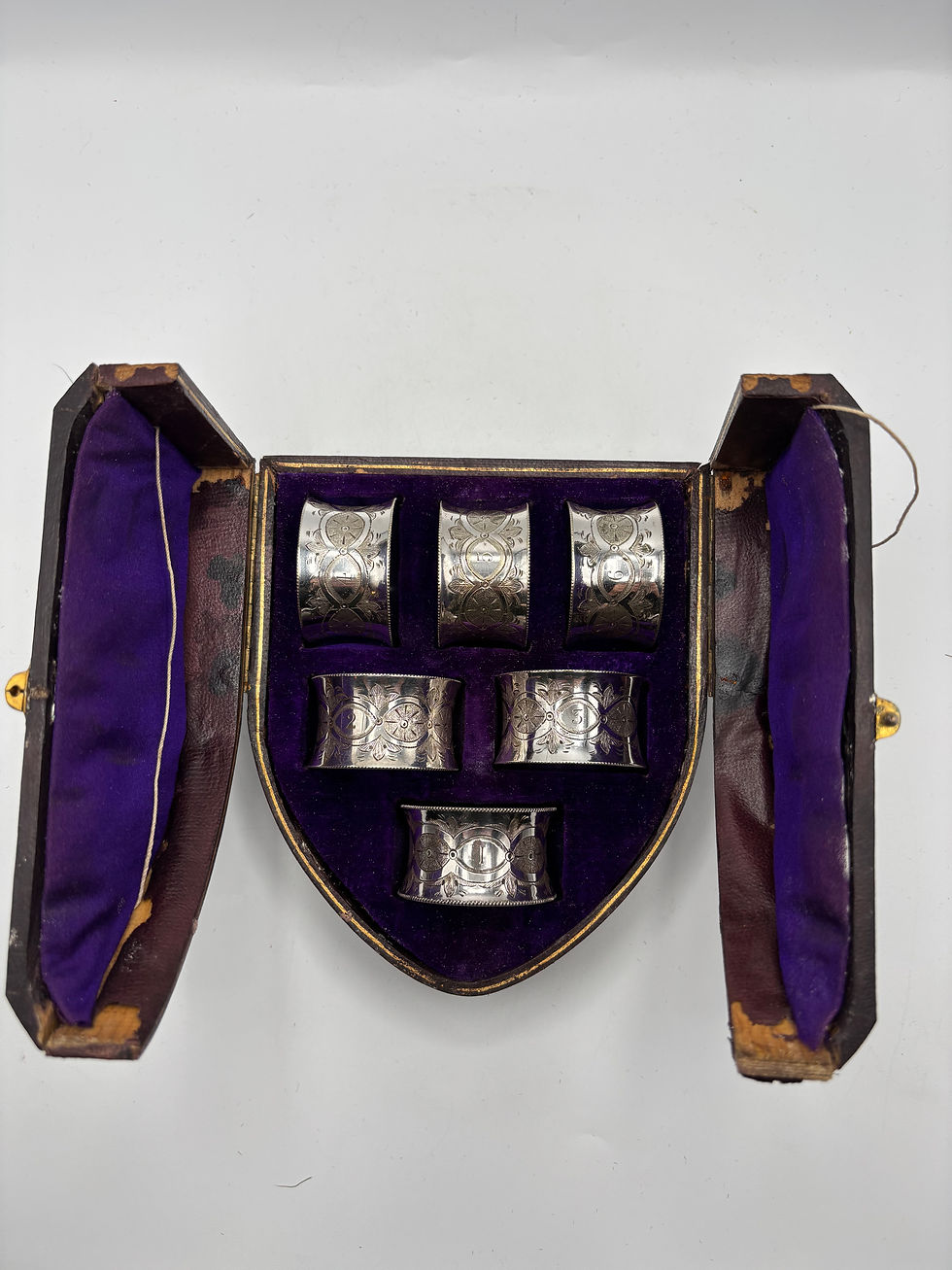 Thumbnail: Set of Six Victorian Solid Silver Napkin Rings in a shield design Box  Napkins a