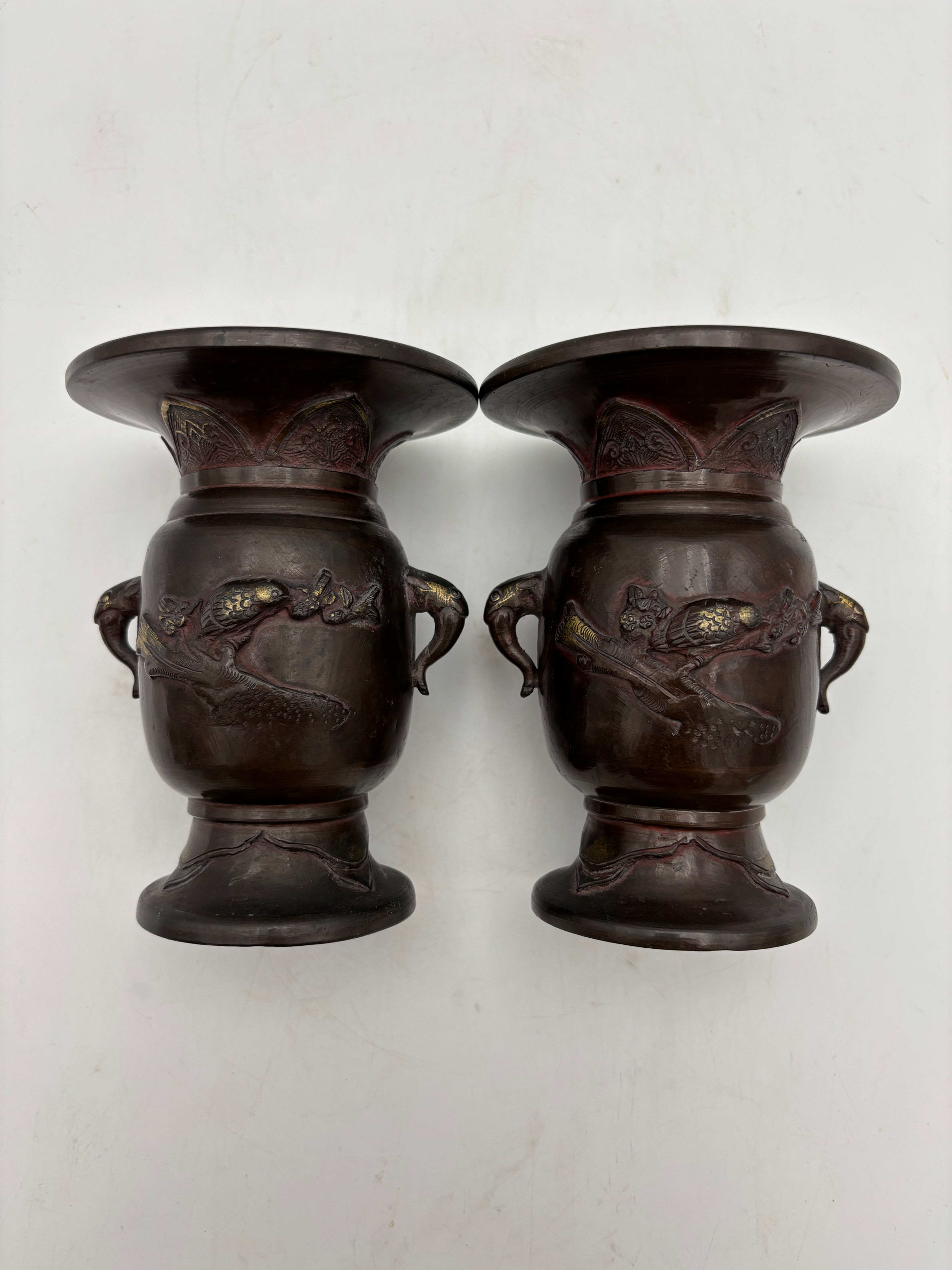 Pair of Antique Japanese bronze urn vases, Meiji period with bird decoration 