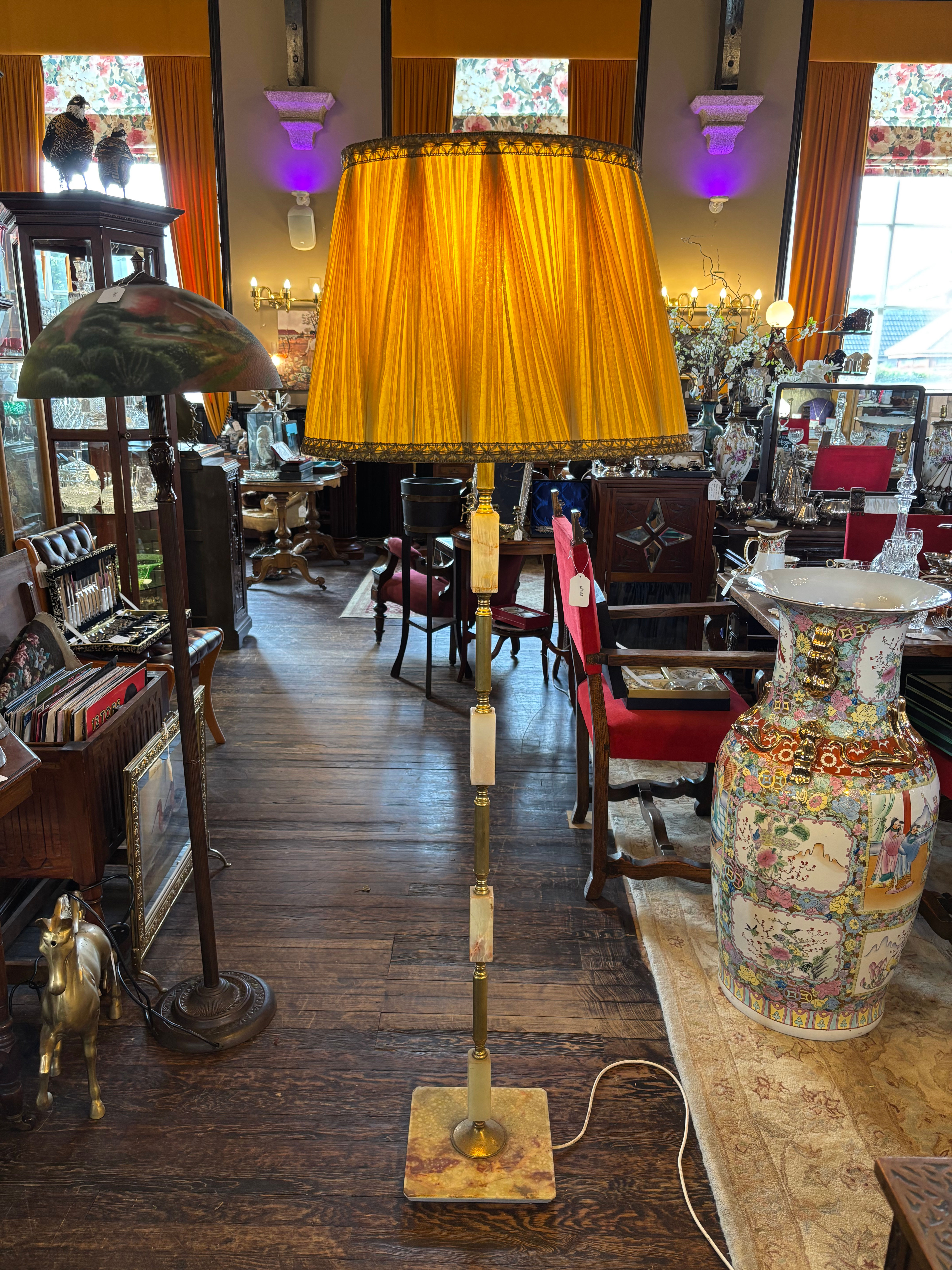 Mid century 1950s to 1970s Hollywood Regency Onyx and Brass Standard Floor Lamp.