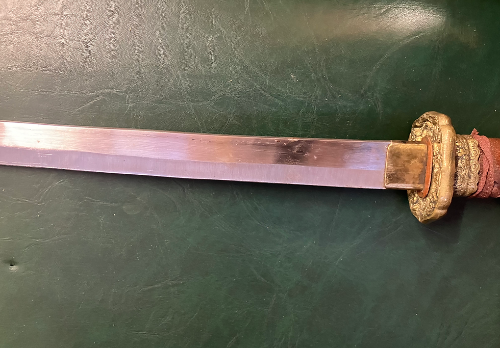 Thumbnail: Antique Japanese Katana With Brass Details and a Leather Wrapped Handle