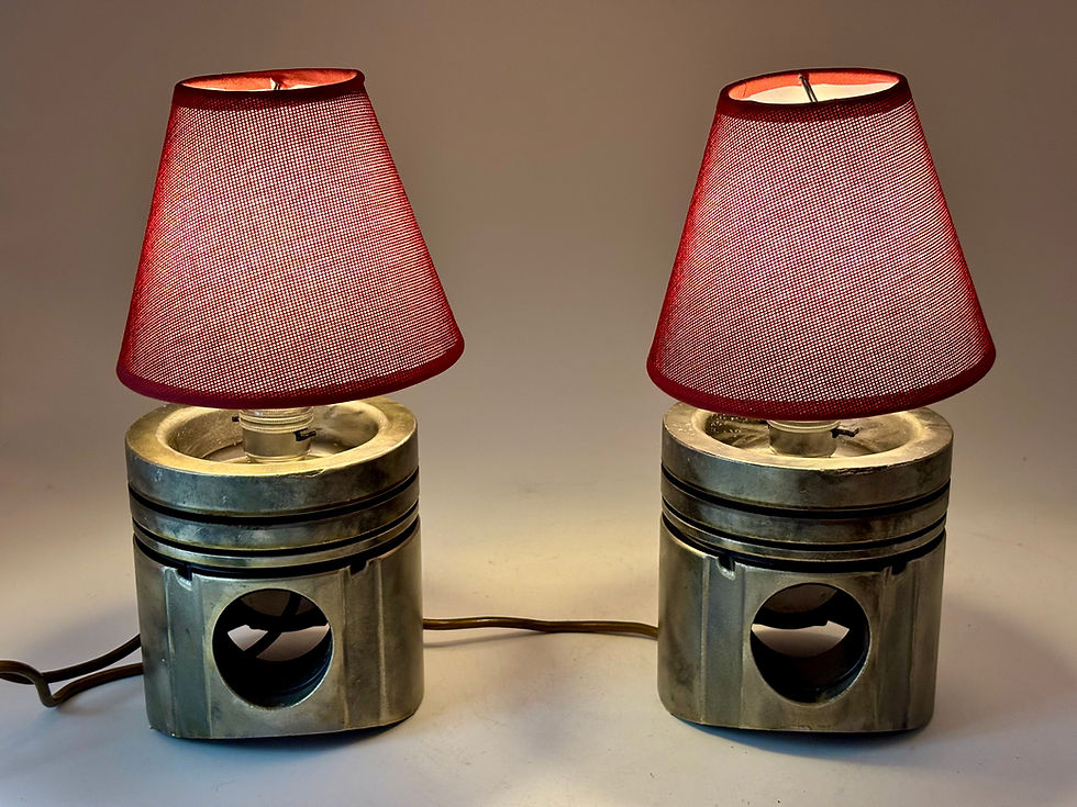 Thumbnail: Pair of Industrial-style table lamps crafted from repurposed engine pistons. 