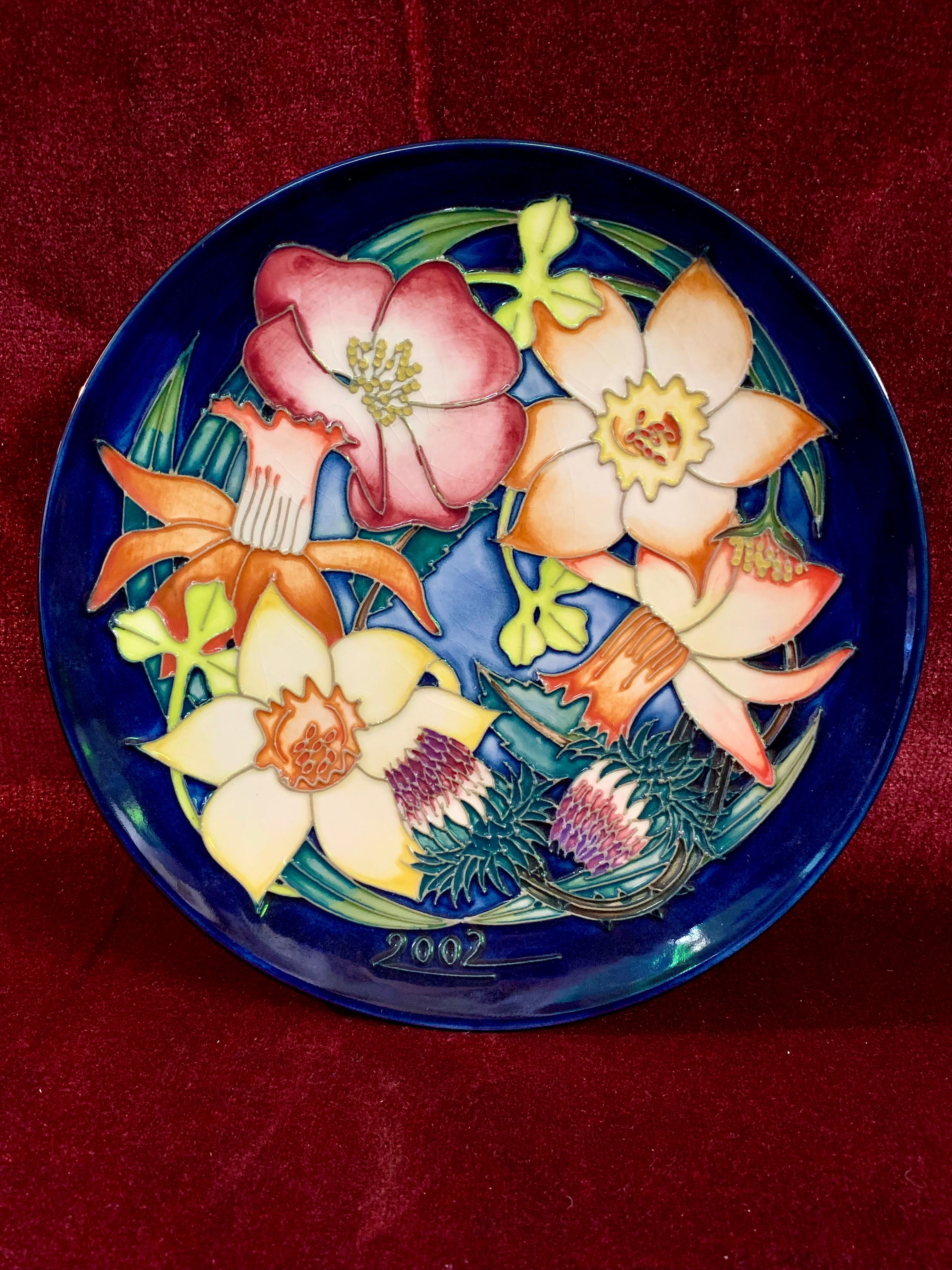 Moorcroft Pottery Golden Jubilee plate from 2002. 