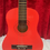 Thumbnail: Vintage Red Children’s Guitar (One String Not Attached)