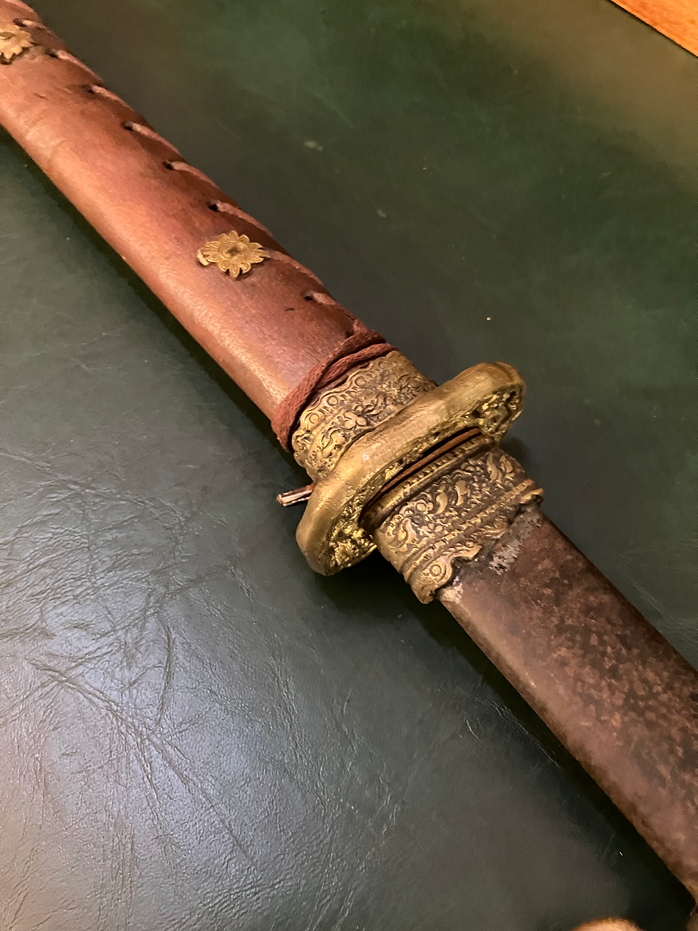 Thumbnail: Antique Japanese Katana With Brass Details and a Leather Wrapped Handle