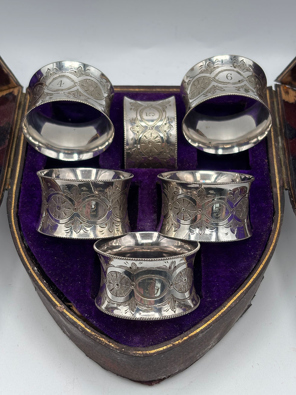 Thumbnail: Set of Six Victorian Solid Silver Napkin Rings in a shield design Box  Napkins a