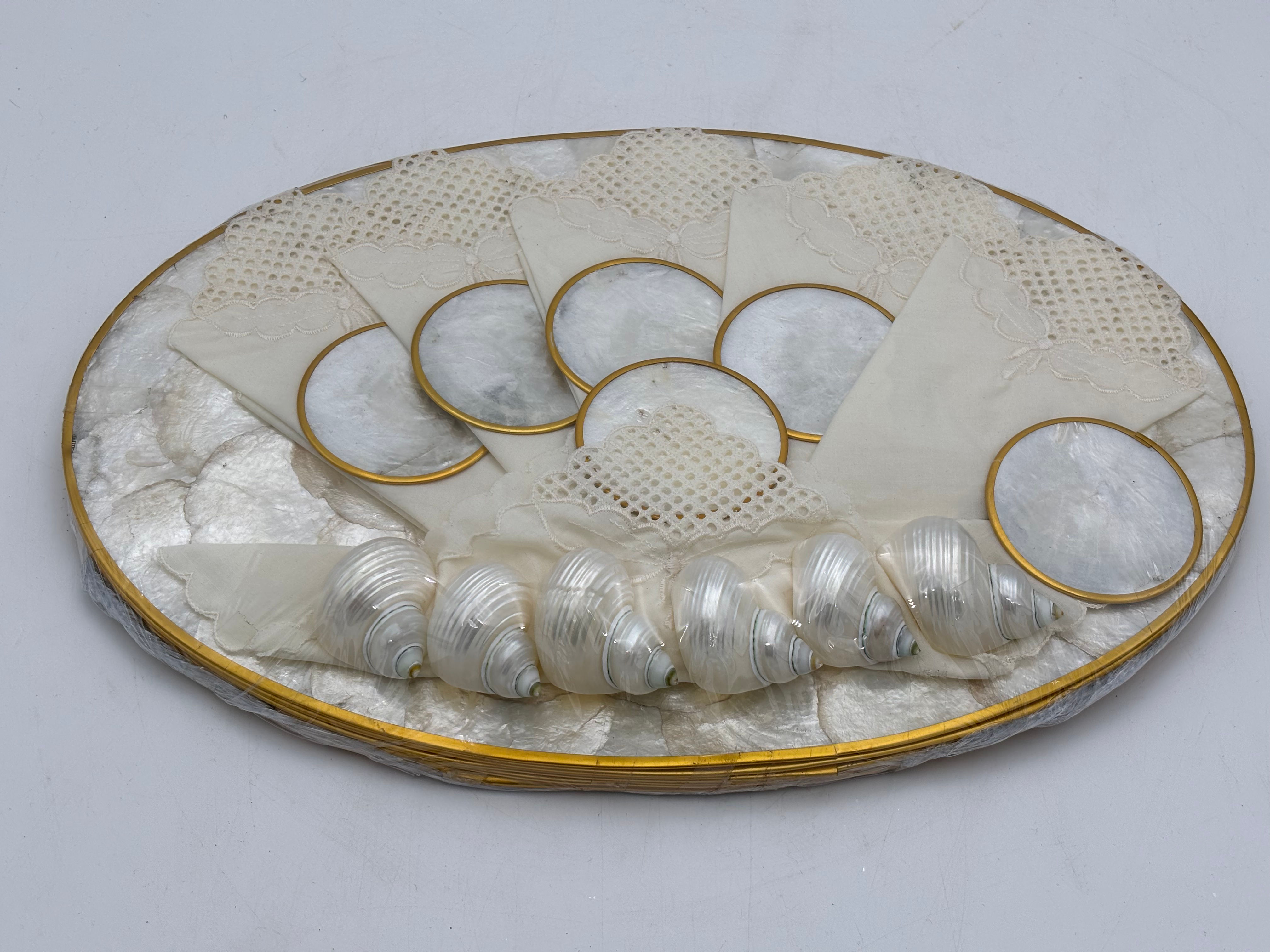 Vintage Capiz Shell placemats, coasters, napkin rings and napkins.
