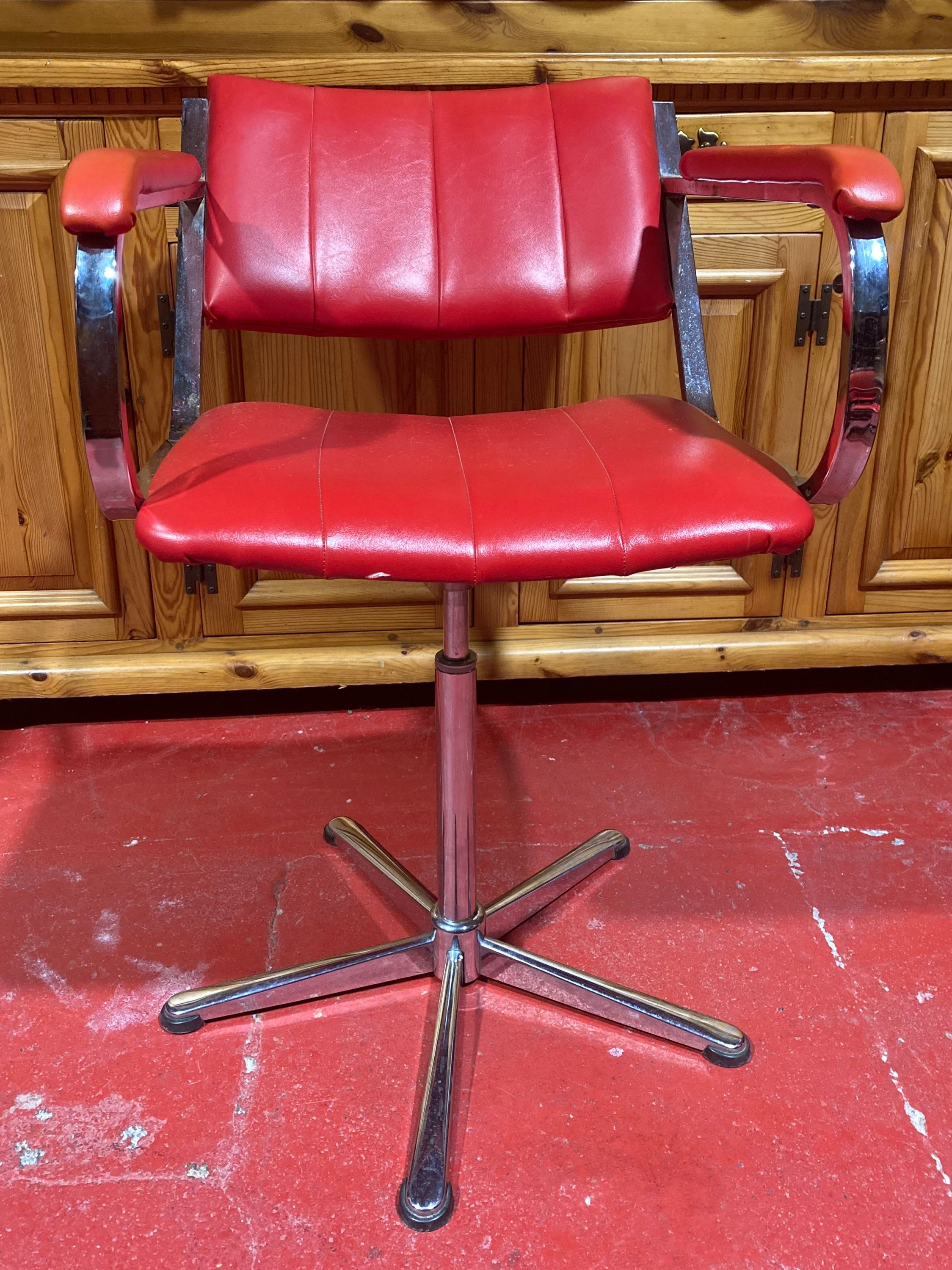 Straight Back Tall Swivel Chair In Red Faux Leather On Chrome Pedestal Leg.