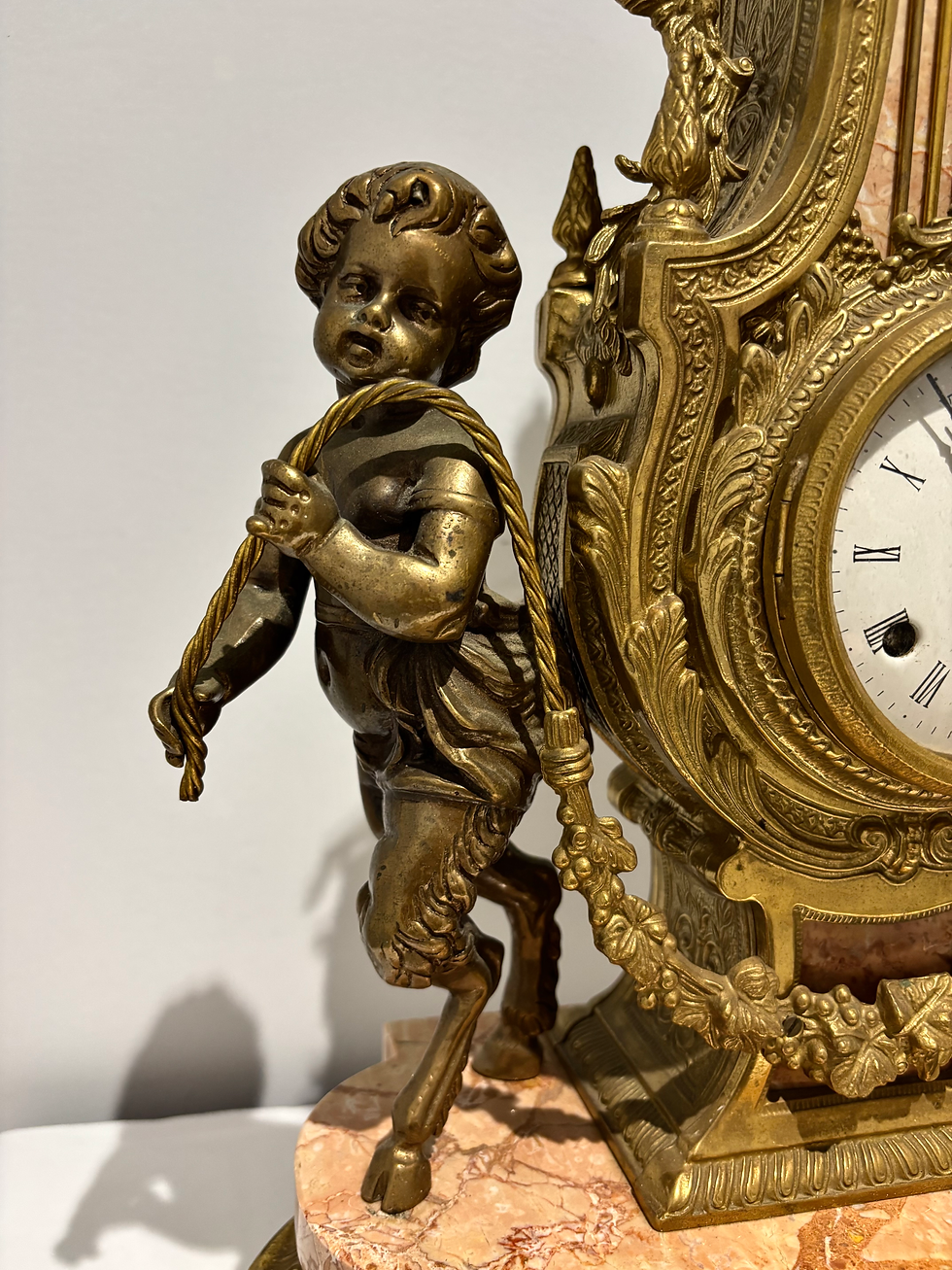 Thumbnail: Vintage Italian Brevettato Brass and Pink Marble Faun Putti Figural Mantle Clock
