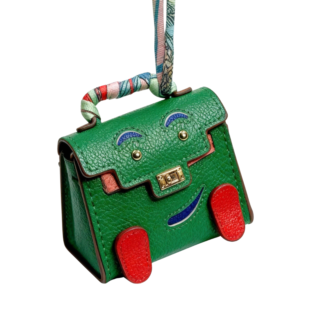 green designer bag charms