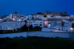 Vejer old town skyline at dusk.