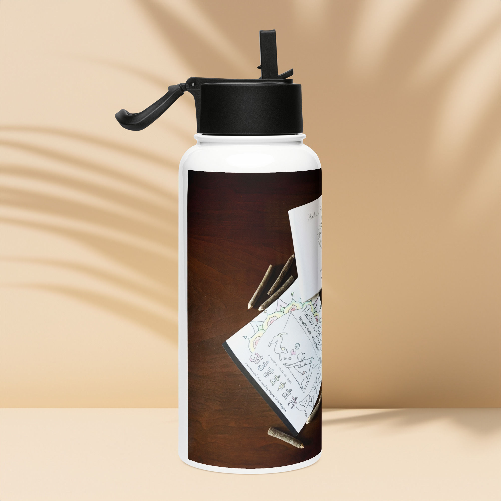 stainless steel water bottle with a straw lid
