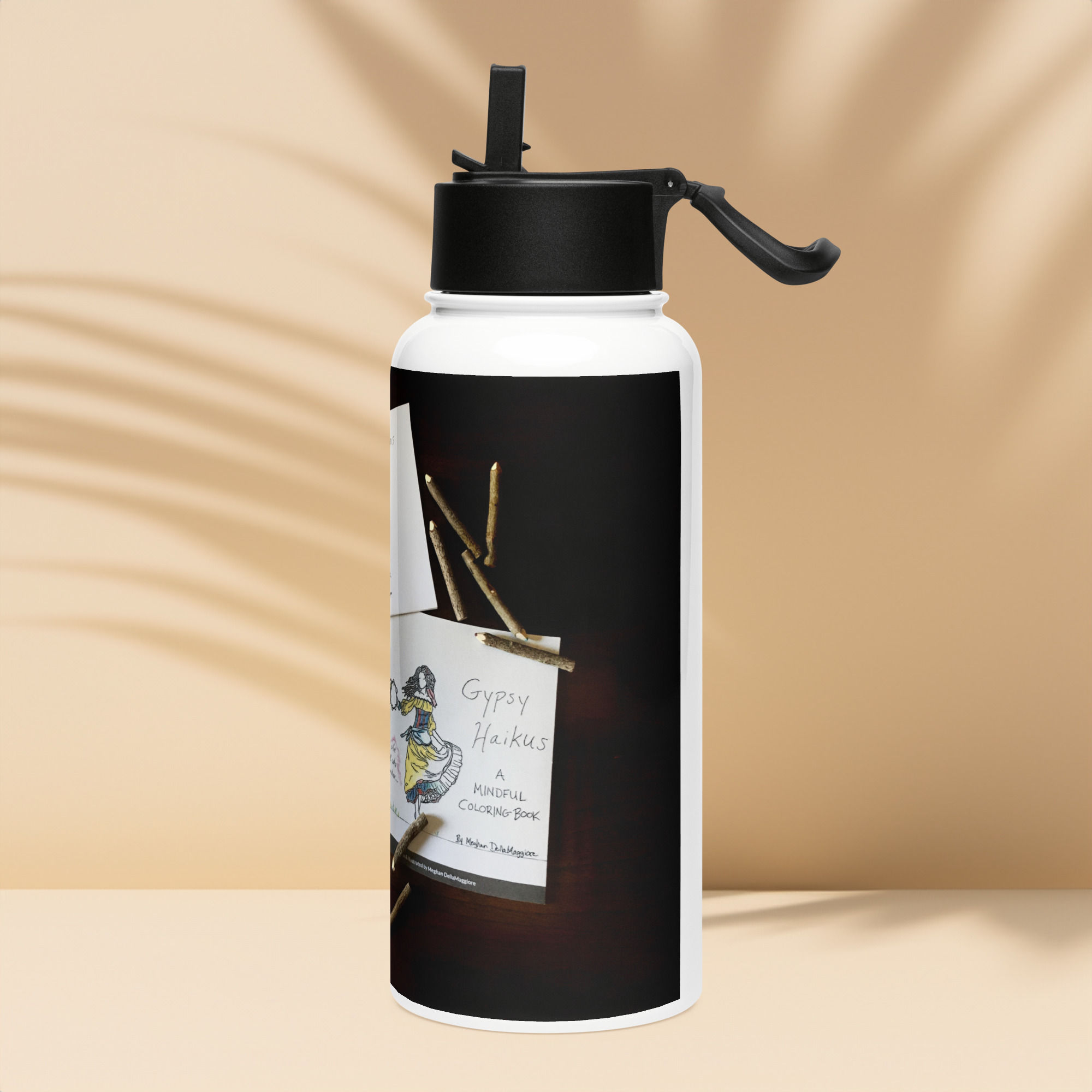 stainless steel water bottle with a straw lid