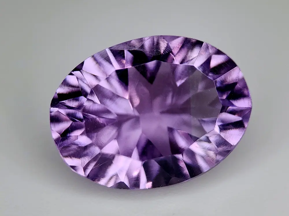 Amétrine ovale naturelle 6.00 ct, taille concave parme et or, VVS Bolivie.