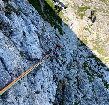 Climber on the Normal Route of Torre Piccola del Falzarego in the Dolomites