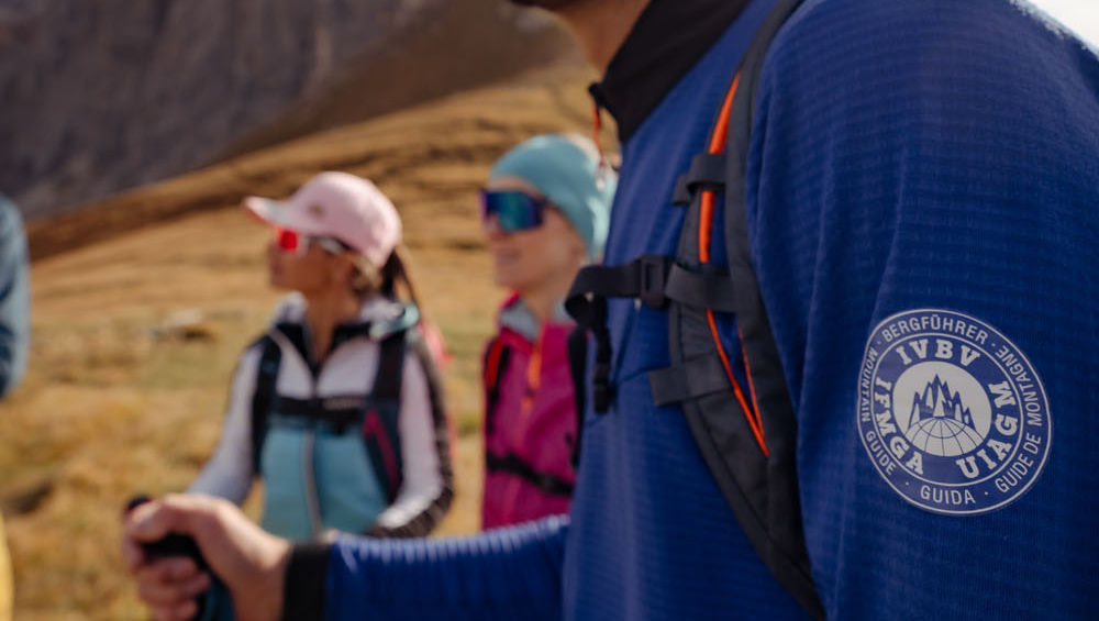 IFMGA and UIMLA certified guides leading hiking day tours in the Dolomites mountains