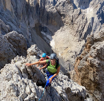 Climbers above Forcella del Sassolungo on Sassolungo climbing route