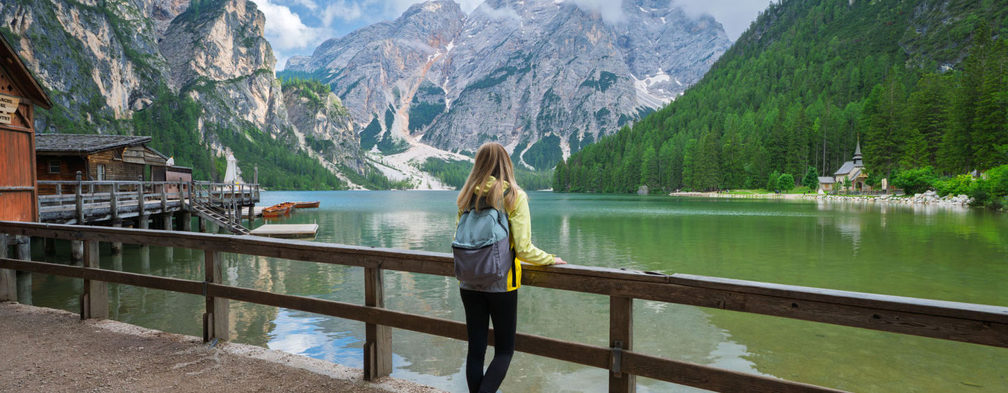 Lago di Braies turquoise mountain lake in the Dolomites surrounded by dramatic peaks