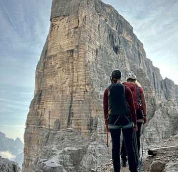 Climbers beneath the walls of Cima Ovest di Lavaredo