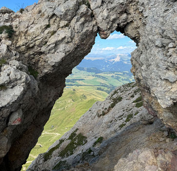 Natural rock window on Via Ferrata Maximilian in the Dolomites