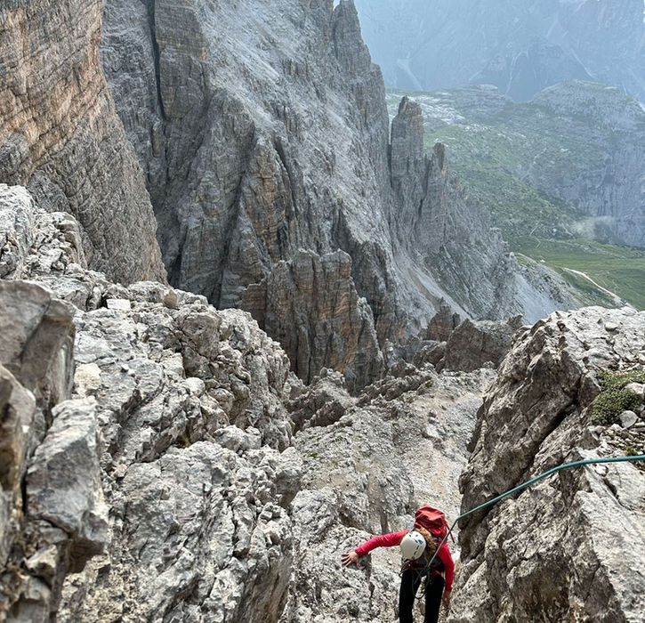 Climber on technical terrain on Cima Ovest di Lavaredo