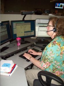 As a Southsound 911 communications officer, Shelley Timbers, of Lakewood (Pierce County), spends eight to 10 hours on the phone during her shifts, dealing with public’s emergency calls, which range from shootings to cows and horses wandering public roadways.