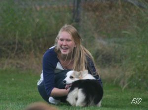 During a mentoring visit at John and Tammie Wilcox’s Win-Star Bed & Biscuit in 2011, Helga Poll Gudjonsdottir, an Icelander, holds Panda, a Pembroke Welsh Corgi puppy.