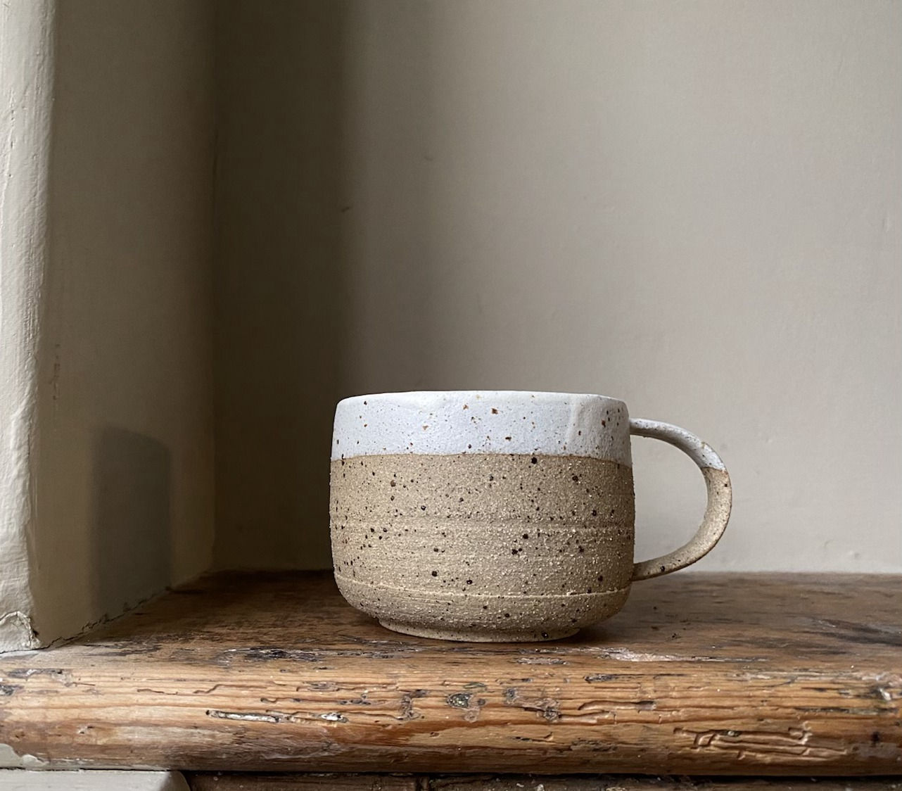 Off white part glazed mug