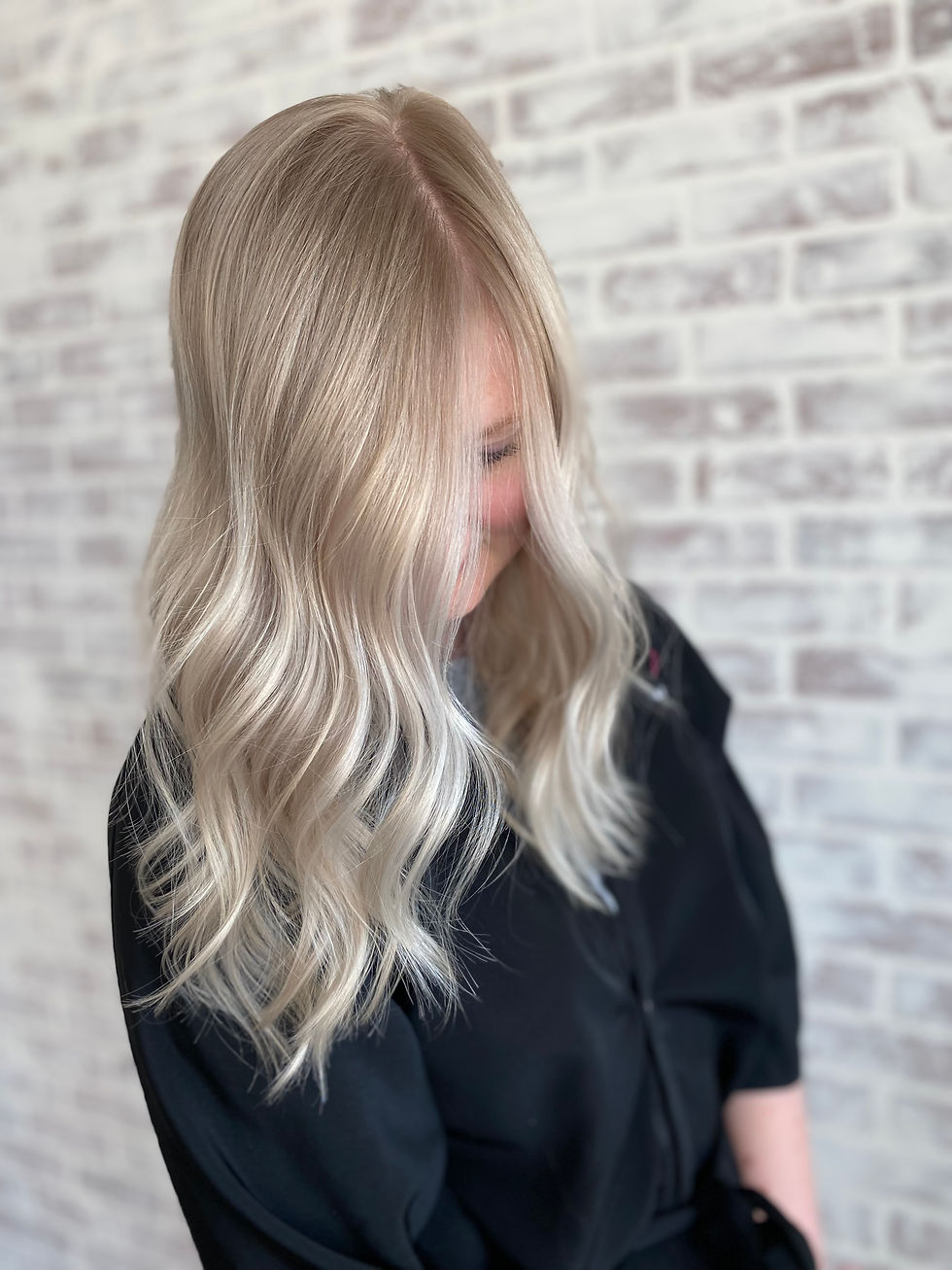 Close-up view of hair strands showing vibrant custom hair color