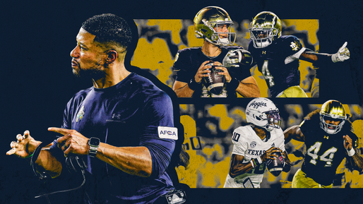 Football coach gestures with headset. Quarterbacks in Notre Dame and Texas A&M jerseys are preparing to throw. Dark, intense setting.