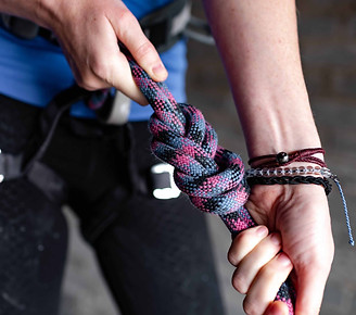 Person tightening knot in rope - Crypto Wingman