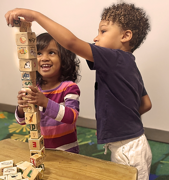 Cosmopolitan Kids preschoolers playing with blocks