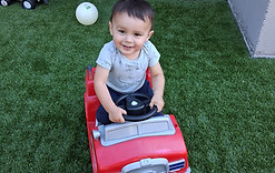 Cosmopolitan Kids waddler playing outside