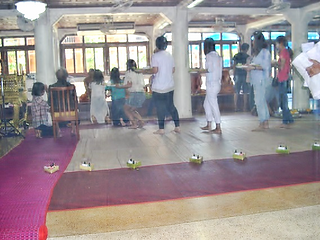 Devotees handing their offerings to the priests_edited_edited