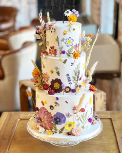 Pressed flower wedding cake