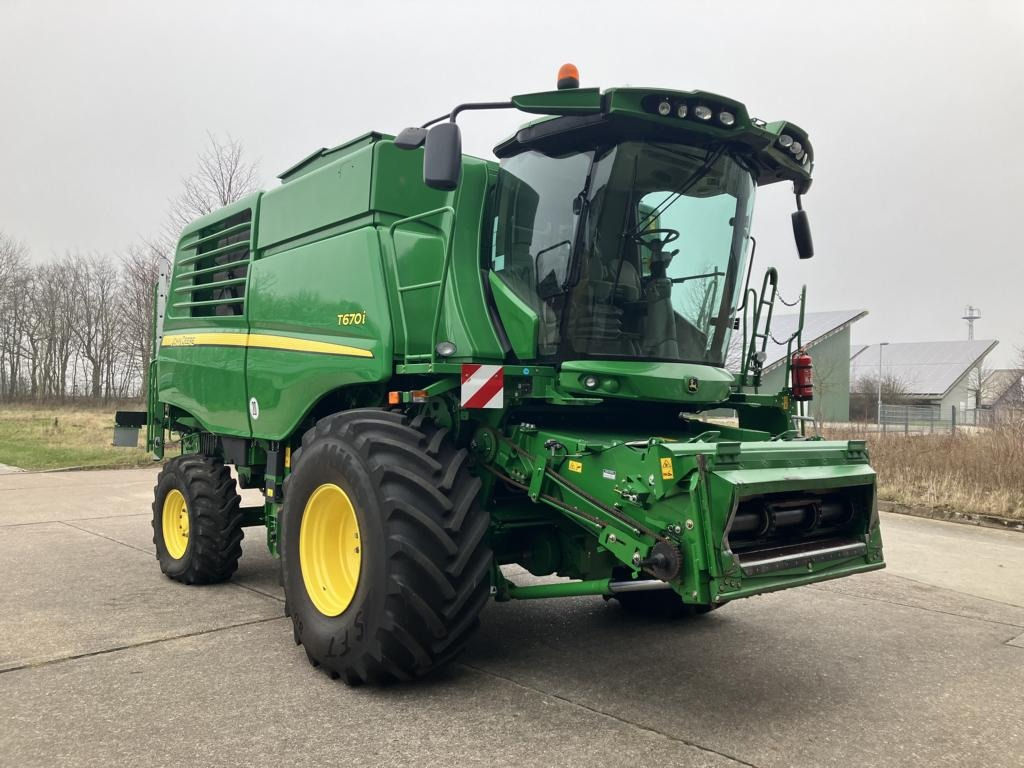 John Deere T670i + JD 625 PF
