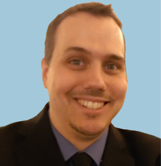 Headshot of a smiling man in a suit and tie