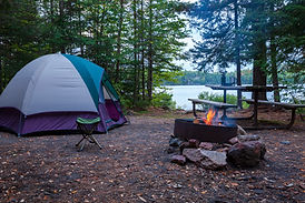 campsite-with-a-fire-and-a-tent-on-a-trout-lake-in-2026-01-06-11-00-28-utc.jpg