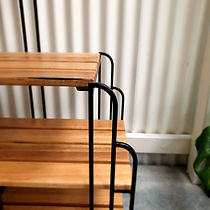 close up view of timber and steel shelving unit