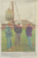 Lansing State Journal Newspaper article with a photo containing Jo Anne Hinds and two fellow Lawyers standing on a farm. 