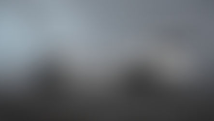 Autonomous vehicles side by side at dawn