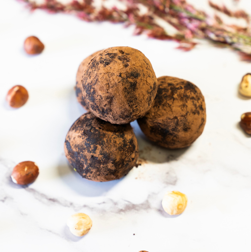 Kitchen Remedy Choc Hazelnut Protein Ball with a rich cacao and roasted hazelnut profile