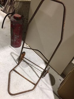 Rustic oil drum trolley