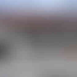 White building with red roof and black shutters, Portugal Travel