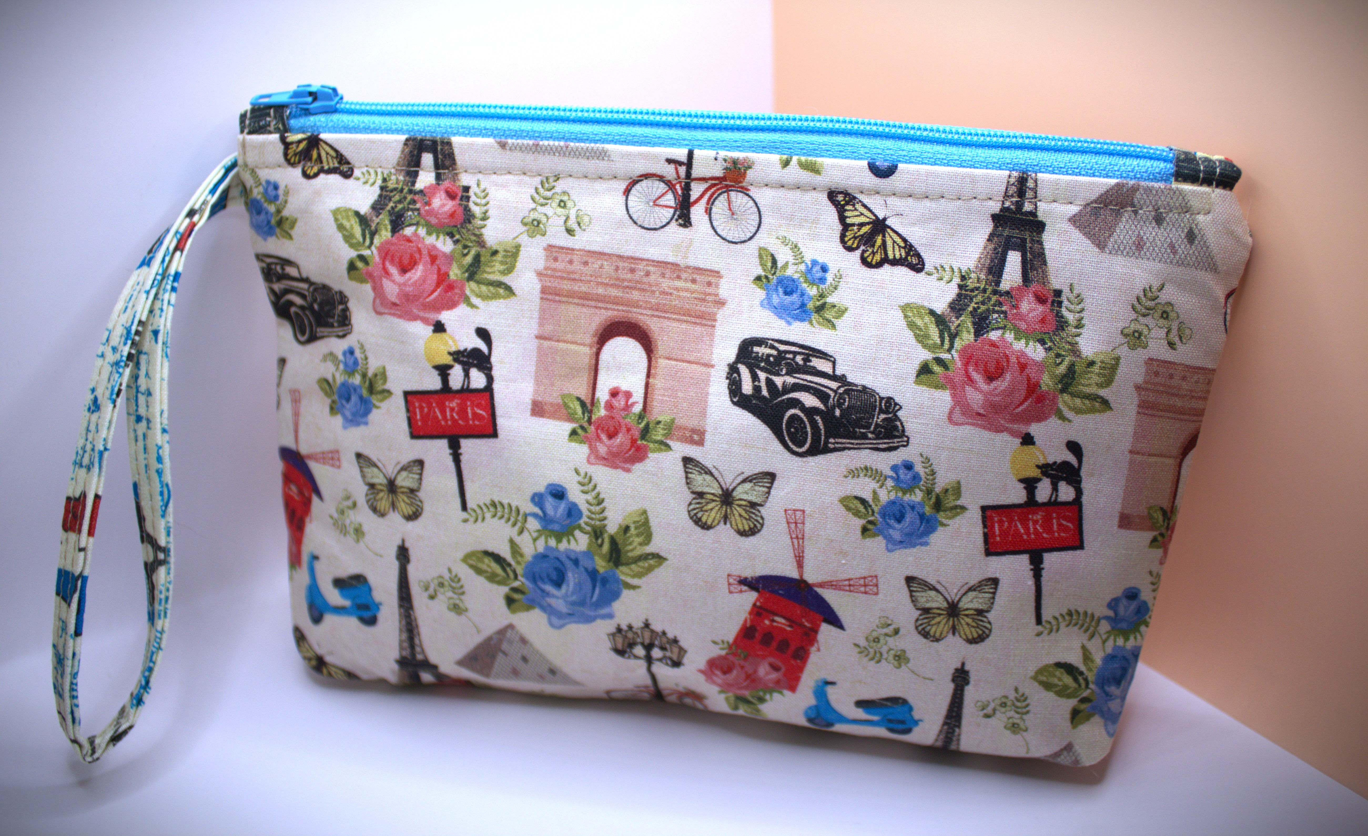 zippered wristlet handbag paris iconic print