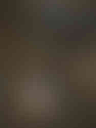 A bride and groom lying on stairs for elopement photos in Paris